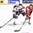 TORONTO, CANADA - JANUARY 2: Switzerland's Nando Eggenberger #22 stick checks the puck away from USA's Luke Kunin #9 during quarterfinal round action at the 2017 IIHF World Junior Championship. (Photo by Matt Zambonin/HHOF-IIHF Images)

